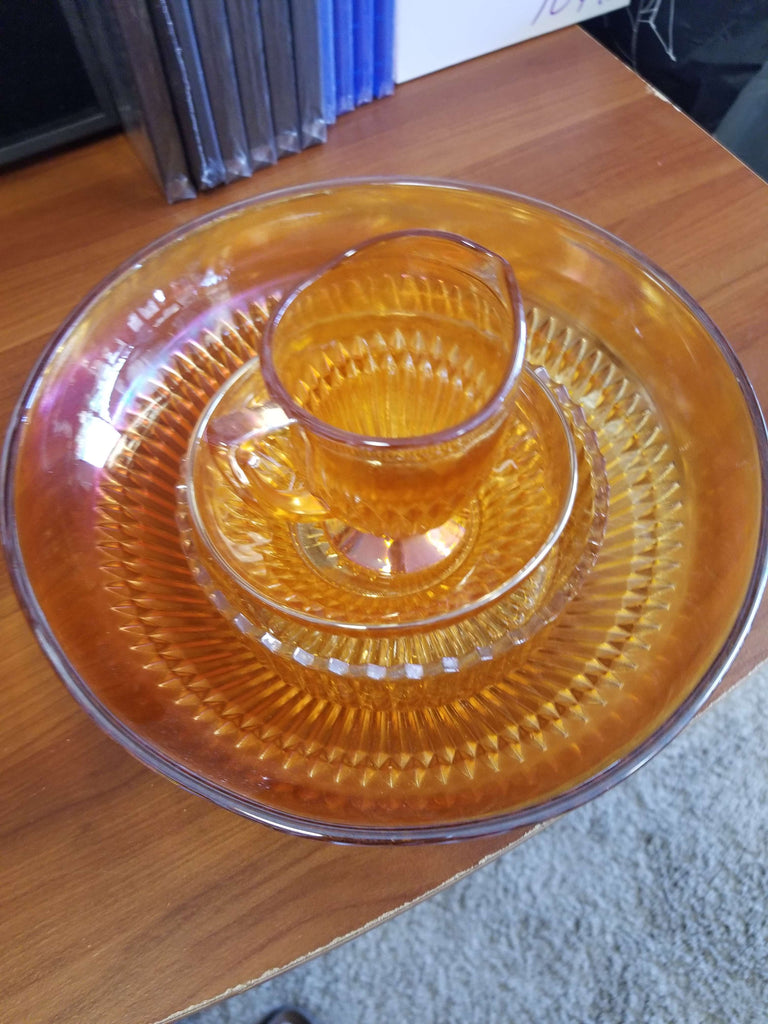 Marigold carnival glass iridesent dinnerware