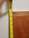 Vintage classic rectangular mirror featuring a warm-toned wooden frame