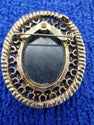 Black resin brooch