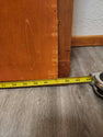 Vintage classic rectangular mirror featuring a warm-toned wooden frame