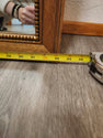 Vintage classic rectangular mirror featuring a warm-toned wooden frame