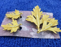 Collectable Gold-Tone leaf brooch and clip on earrings set