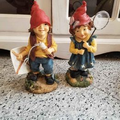 Garden gnomes boy and girl figurines